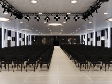 Blick durch die Stuhlreihen in der Halle des First Class Event Fürth